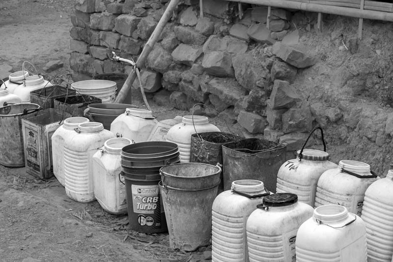 Human Right to Water in Nagaland - Containers lined up at a rural public tapstand in Mokokchung district